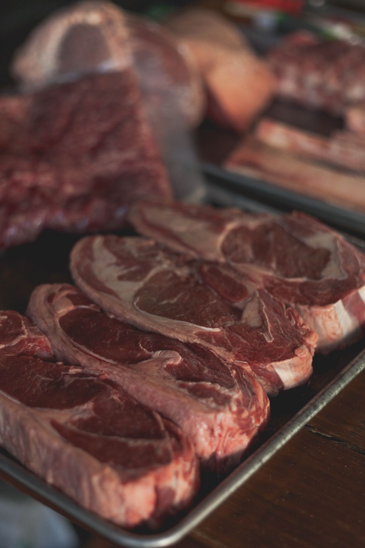 Premium marbled beef cuts prepared on a tray — placeholder photo